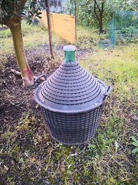 Damigiane in vetro con cesta