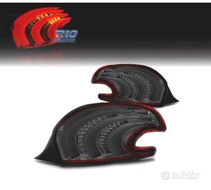 FANALI PER PEUGEOT 208 12-15 LIGHT BAR ROSSO FUMÉ