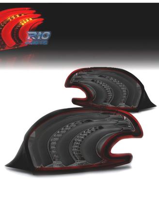 FANALI PER PEUGEOT 208 12-15 LIGHT BAR ROSSO FUMÉ