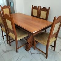 Sala da pranzo con tavolo, 6 sedie e credenza