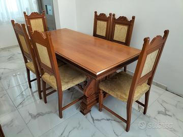 Sala da pranzo con tavolo, 6 sedie e credenza