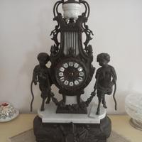 OROLOGIO e COPPIA DI CANDELABRI