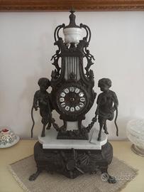 OROLOGIO e COPPIA DI CANDELABRI