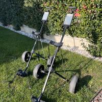 Coppia di carrelli porta sacca da golf.