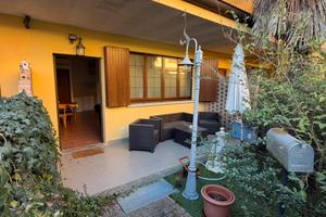 Appartamento con giardino in Villetta a schiera