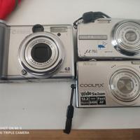 Tre macchine fotografiche digitali Canon Olympus N