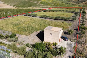 Terreno con fabbricato