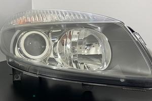 Nuovo&Orig. HELLA Faro Renault Scenic II