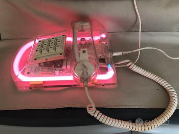 Telefono vintage luminoso + telefono Swatch