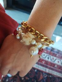 braccialetto di perle con.harm in vetro di murano 