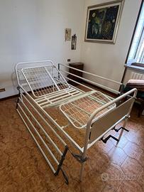 Letto da degenza manuale con sponde anticaduta