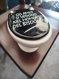 Salvadanaio a forma di WC