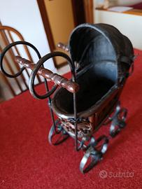 antica carrozzina giocattolo 