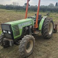 Trattore con fresa, aratro e strip