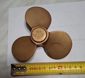 FERMACARTE FORMA DI ELICA IN BRONZO 1991