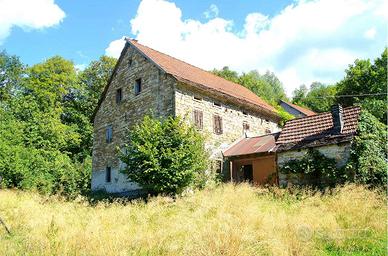 Terreno con abitazioni in Alpago