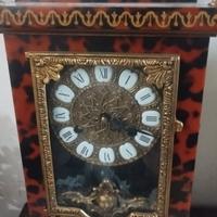 Orologio ottone e legno a molla