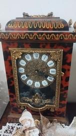 Orologio ottone e legno a molla