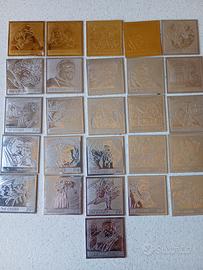 francobolli laminati color oro e argento 