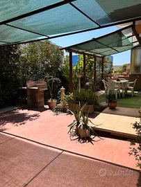 Appartamento piano terra con box auto