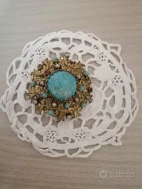 Vecchia spilla dorata con pietra turchese vintage 