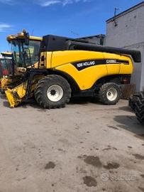 Mietitrebbia  usata completa di barra grano