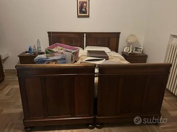 2 letti singoli che uniti formano un letto matrimo