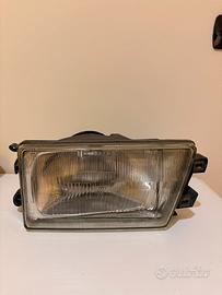 Faro alfa 75 destro carello