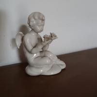 Statuetta Capodimonte porcellana  bianca 