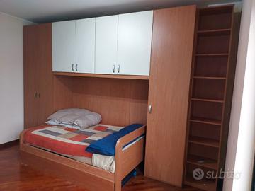 Armadio a ponte e letto 