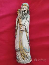 statuina cinese anziano