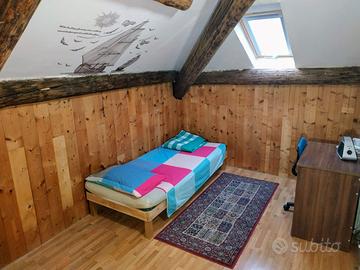 Stanza singola a Monza con posto auto prvt