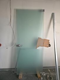 Porta in vetro con sopralluce