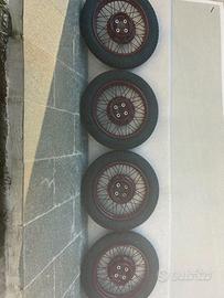 cerchi nuovi gommati  a nuovo 4.00/4.25x17