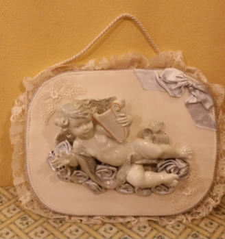 Putto in ceramica