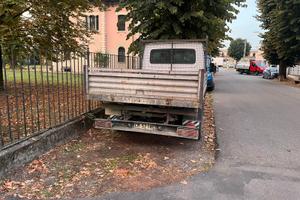 Autocarro ribaltabile trilaterale