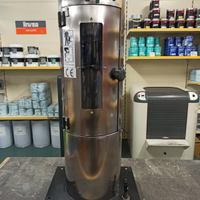 Macchina per bombolette spray