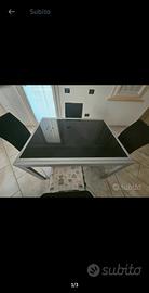 tavolo in vetro con sedie 