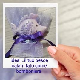 Tre calamite a forma di pesce