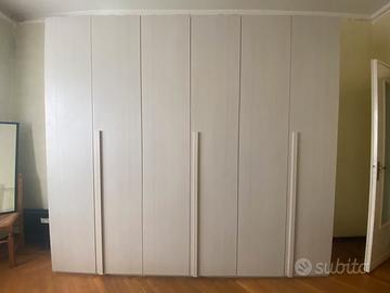 Armadio a 6 ante con cassettiera e specchio