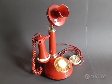 Telefono rosso a candela vintage