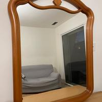 Specchio con cornice in legno