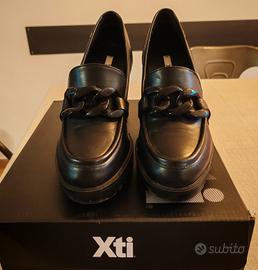 Mocassino nero con tacco