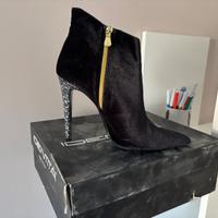 Scarpe tronchetto identità
