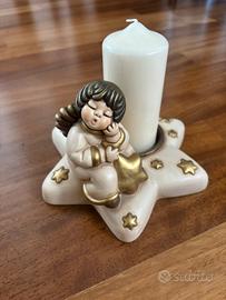 Angelo con stella portacandela Thun