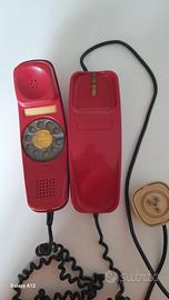 telefono vintage rosso con disco 