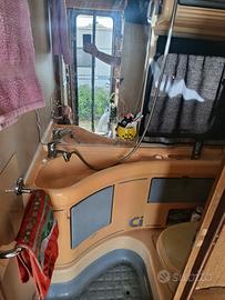 camper mansardato