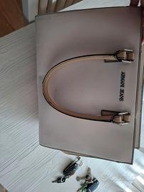 borsa Armani e Guess