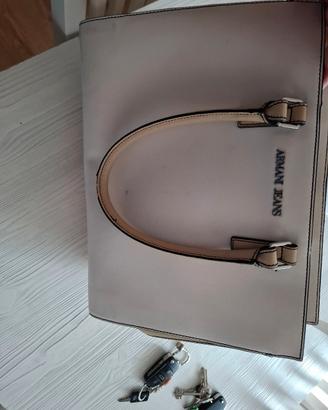borsa Armani e Guess
