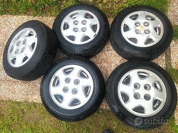 CERCHI IN LEGA USATI 14" NISSAN 4 FORI
